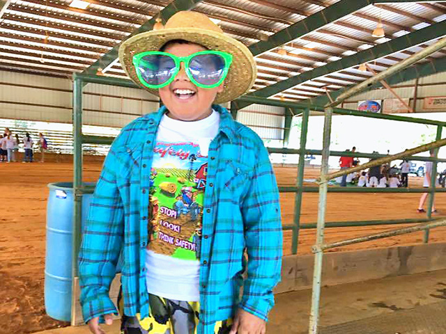Who knew safety could be so much fun? Progressive Agriculture Safety Days are designed to be age-appropriate, hands-on, educational and, most importantly, FUN! At a Safety Day held in Mississippi, this participant learned about the harmful effects of UV rays and identified ways to safeguard his skin from everyday dangers of the sun by using wide-brim hats, sunglasses, long-sleeved shirts and sunscreen, Image by Progressive Agriculture Foundation